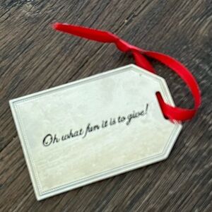 Neiman Marcus Silver Tone gift tag shaped Ornament. 2in x 3 in.